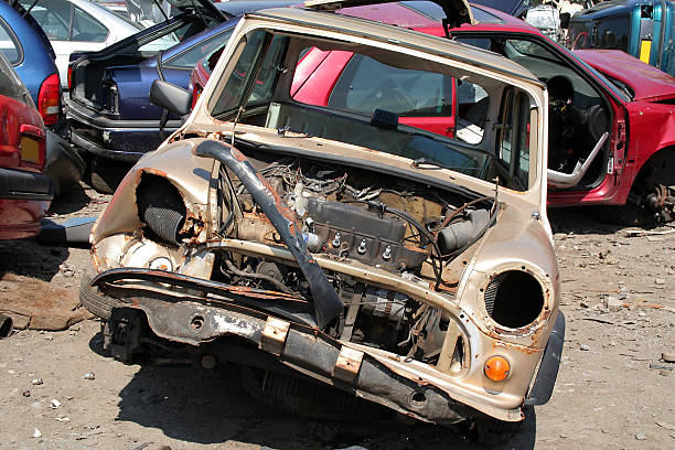 Sell Your Junk Car A wrecked car in a junk yard